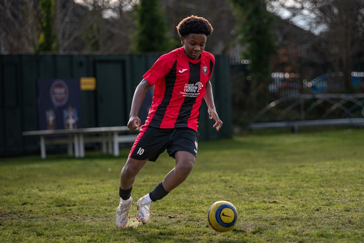 Lions player heading the ball during the Chipstead match
