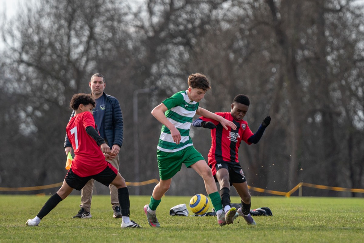 Lions centre-back passing out from defence against Chipstead